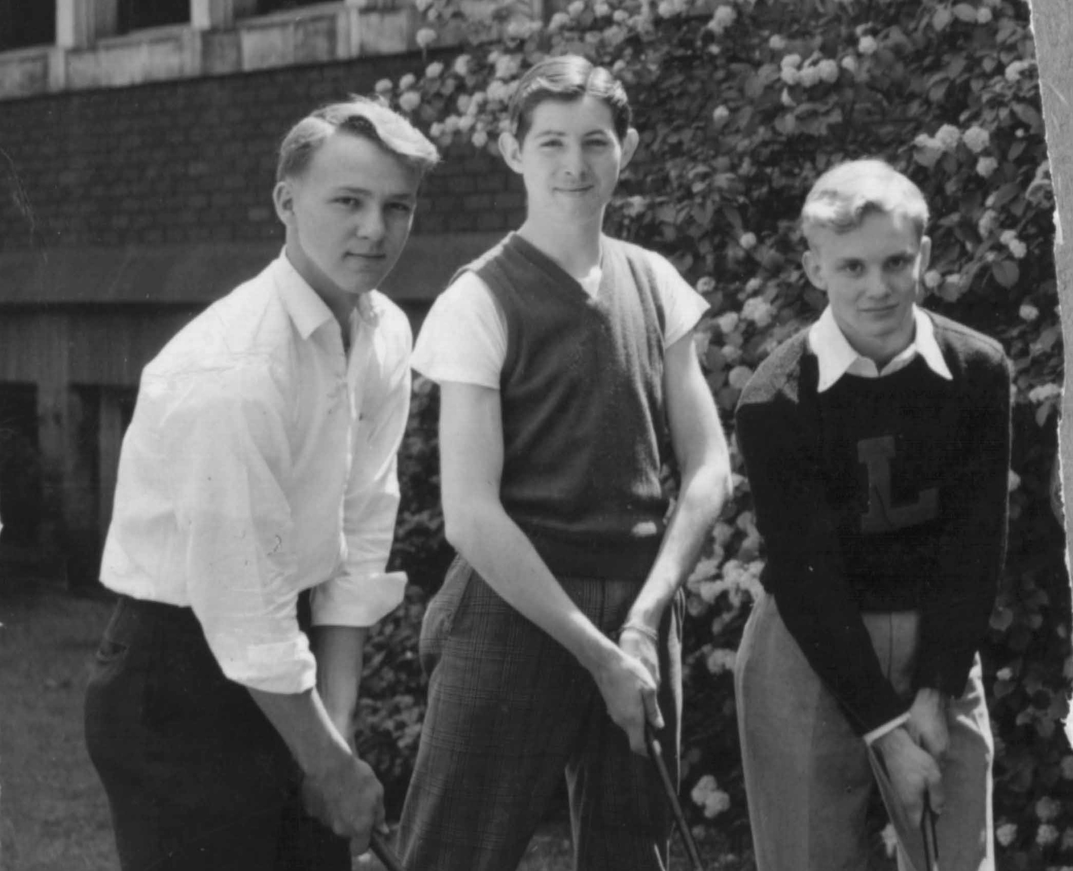 Arnold Palmer, left, with some of his Latrobe High School teammates in the 1940s. (Post-Gazette)