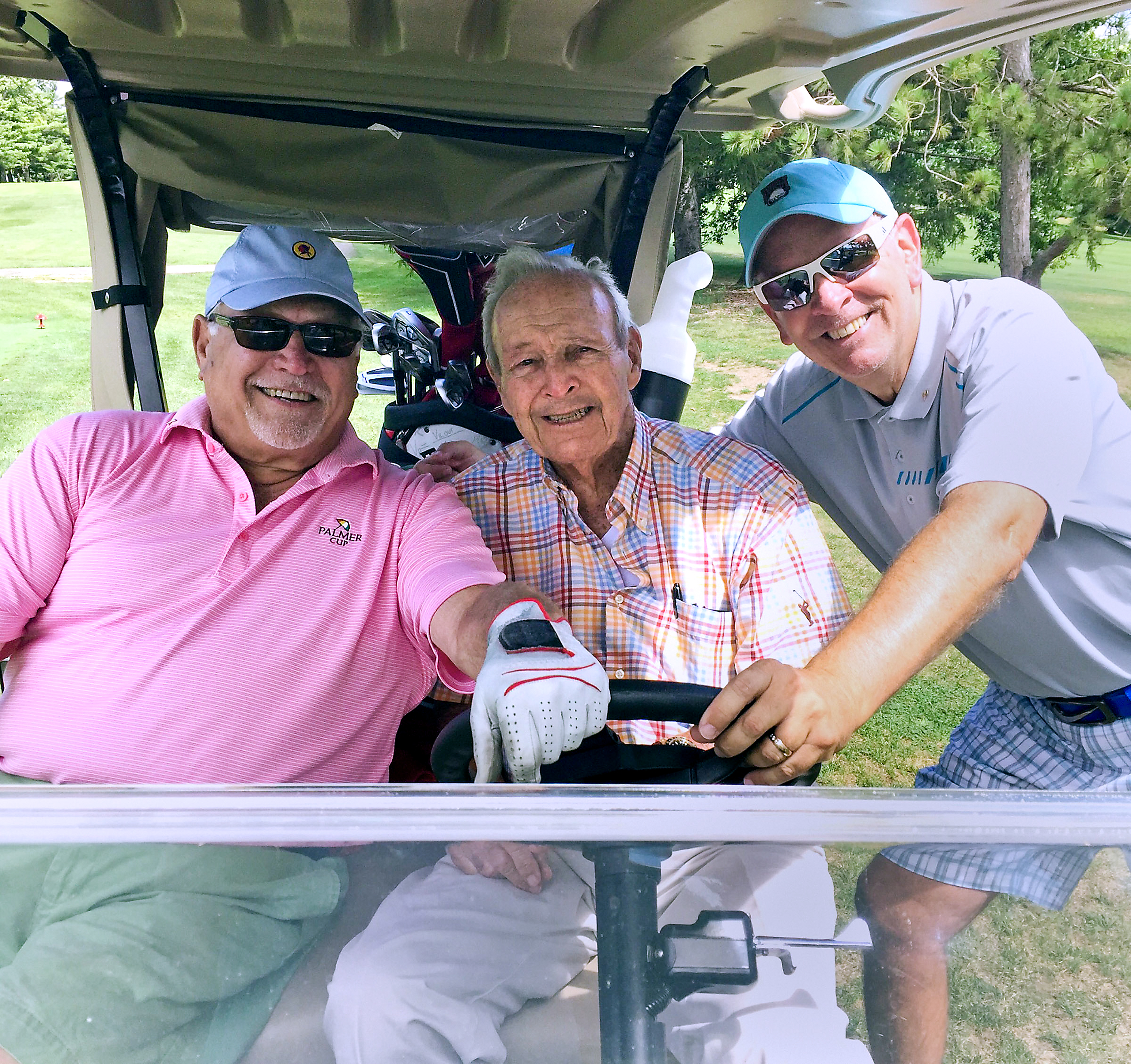 Arnold Palmer, center, Post-Gazette golf writer Gerry Dulac, right, and The Fan golf host Mike Dudurich at Latrobe Country Club in August.