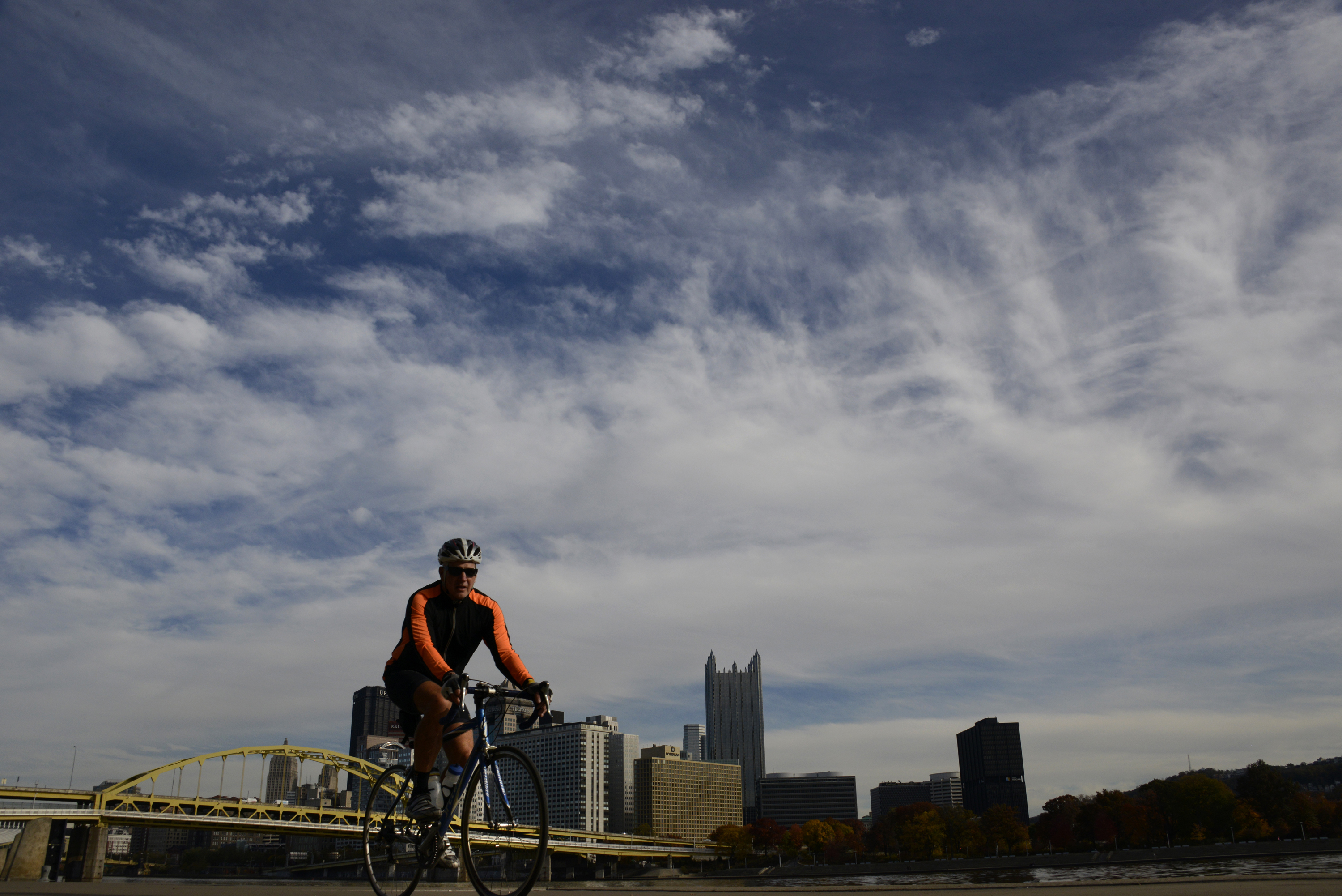 The North Shore Segment of the Three Rivers Heritage Trail --- with the Ft. Duquesne Bridge and the Pittsburgh skyline in the background. (Darrell Sapp/Post-Gazette)