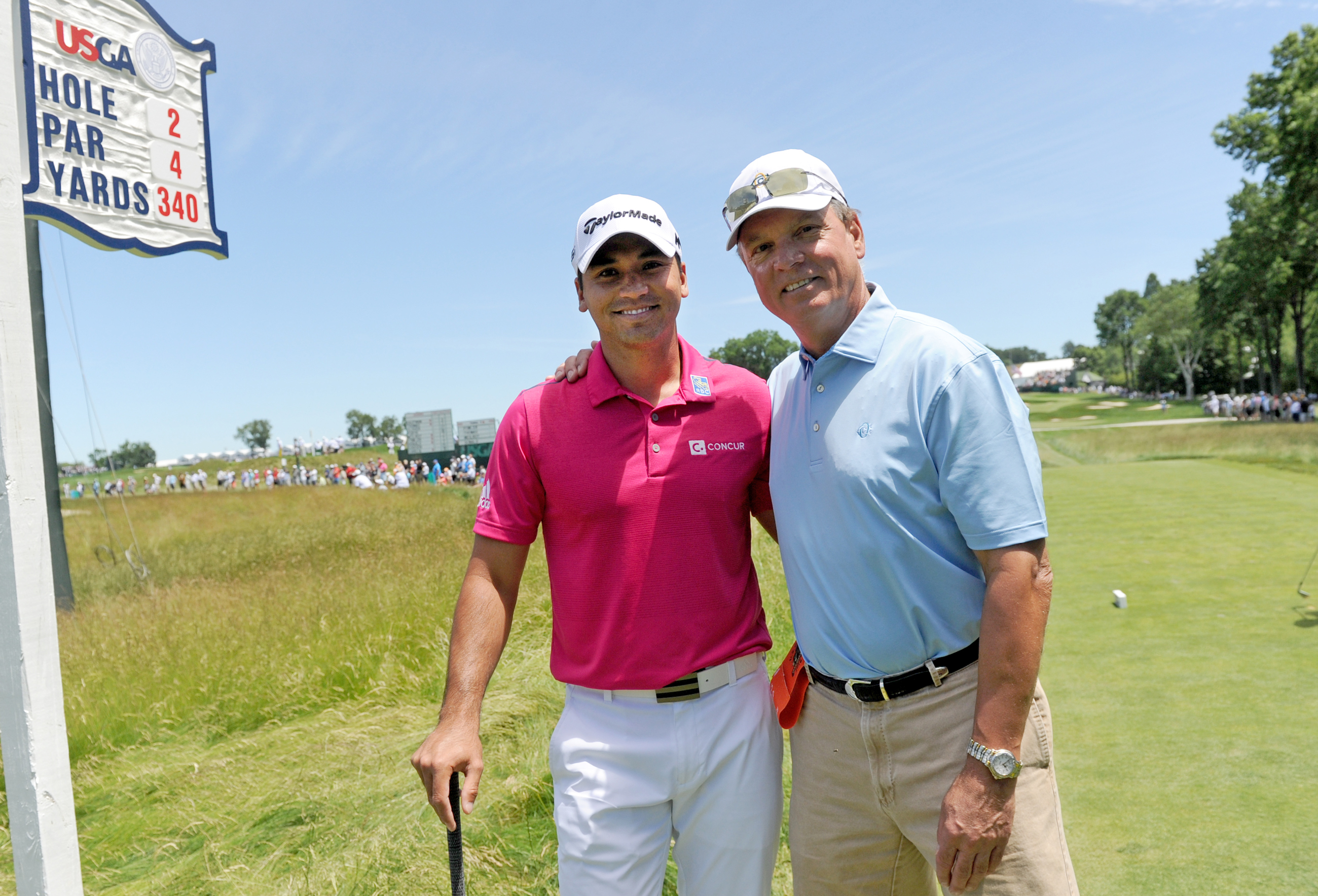 Jason Day, left, poses with Dr. Jim Bradley on the second hole during Day's practice round Tuesday at Oakmont Country Club. (Matt Freed/Post-Gazette)