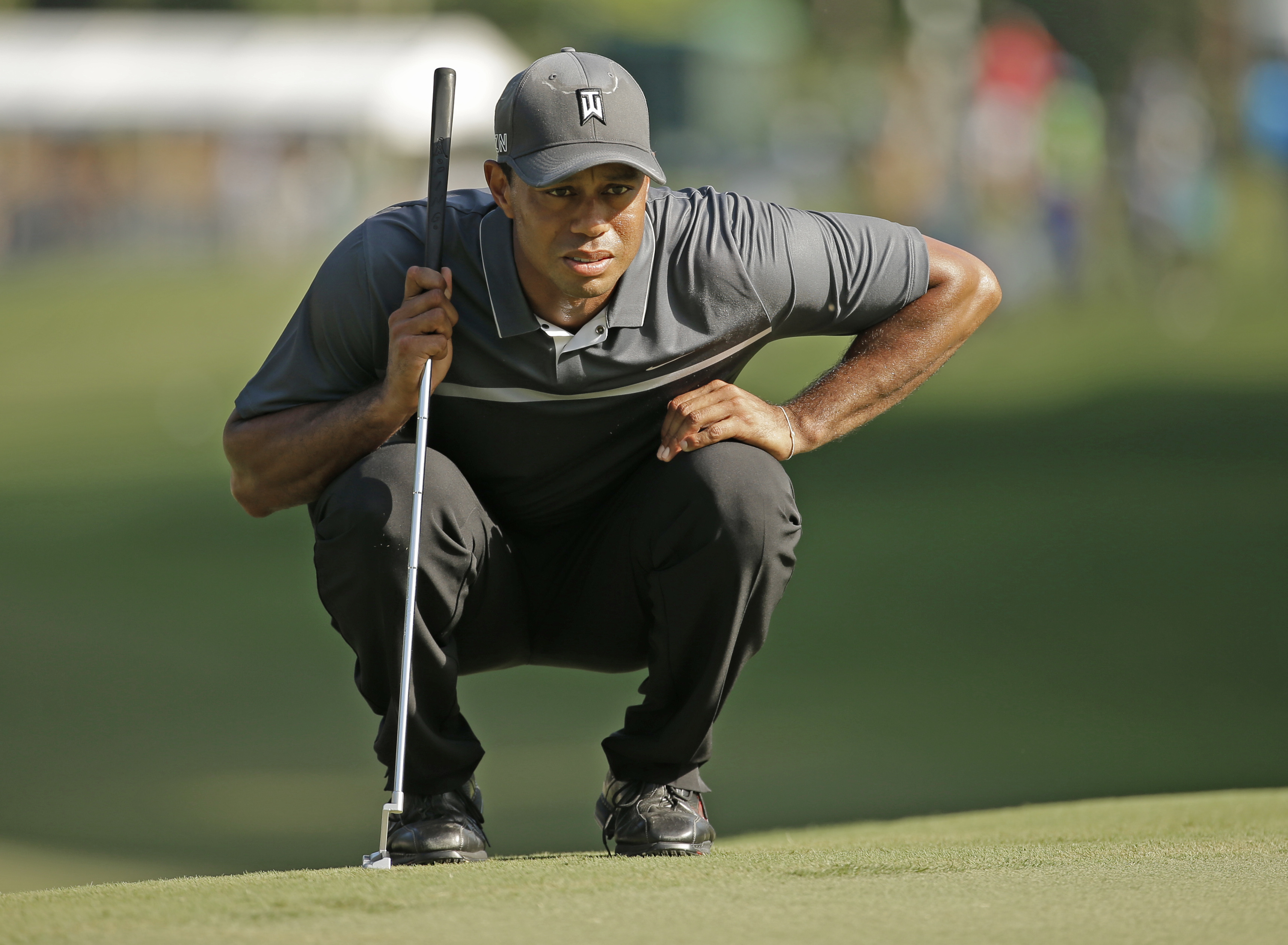 Tiger Woods has won 14 majors but none since 2008. (Chuck Burton/Associated Press)
