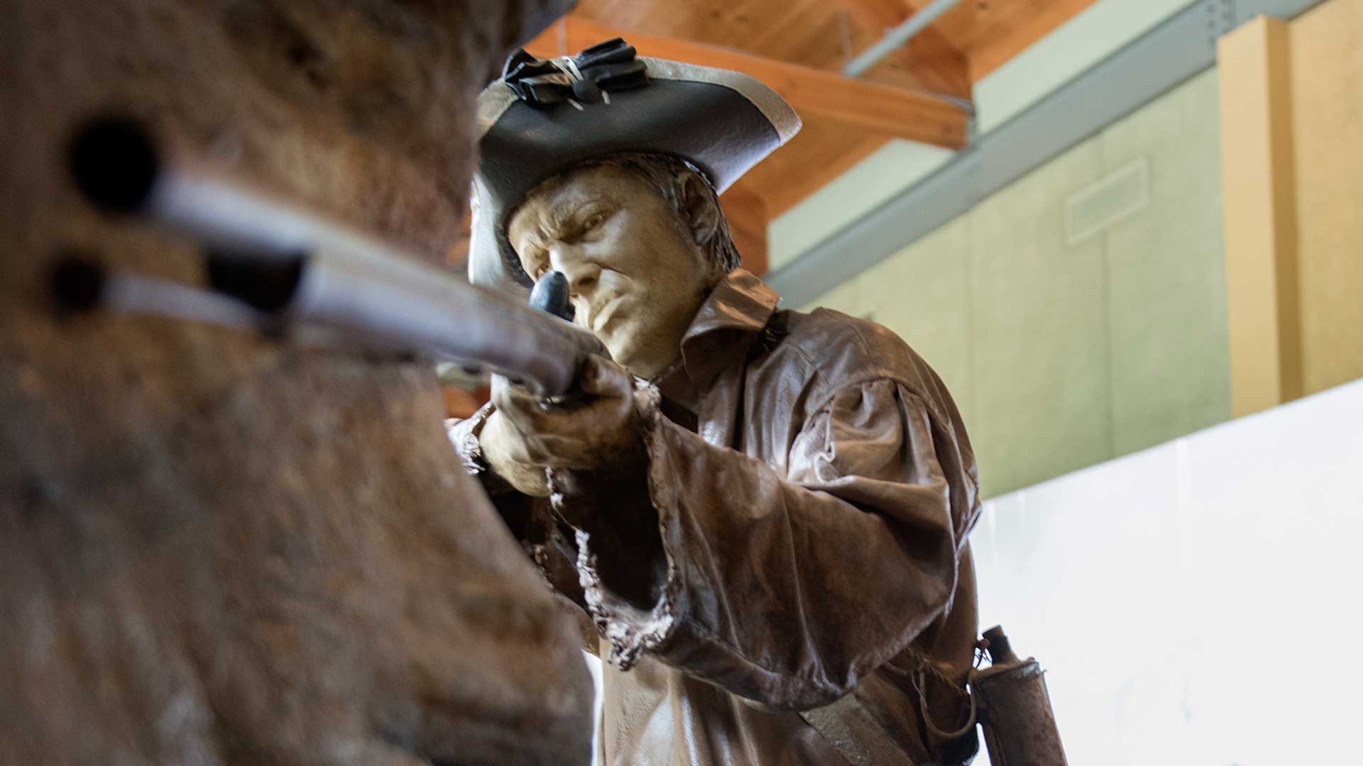 A model of a soldier crouches in the Fort Necessity National Battlefield Visitor Center in Farmington on June 22, 2016. (Haley Nelson/Post-Gazette)