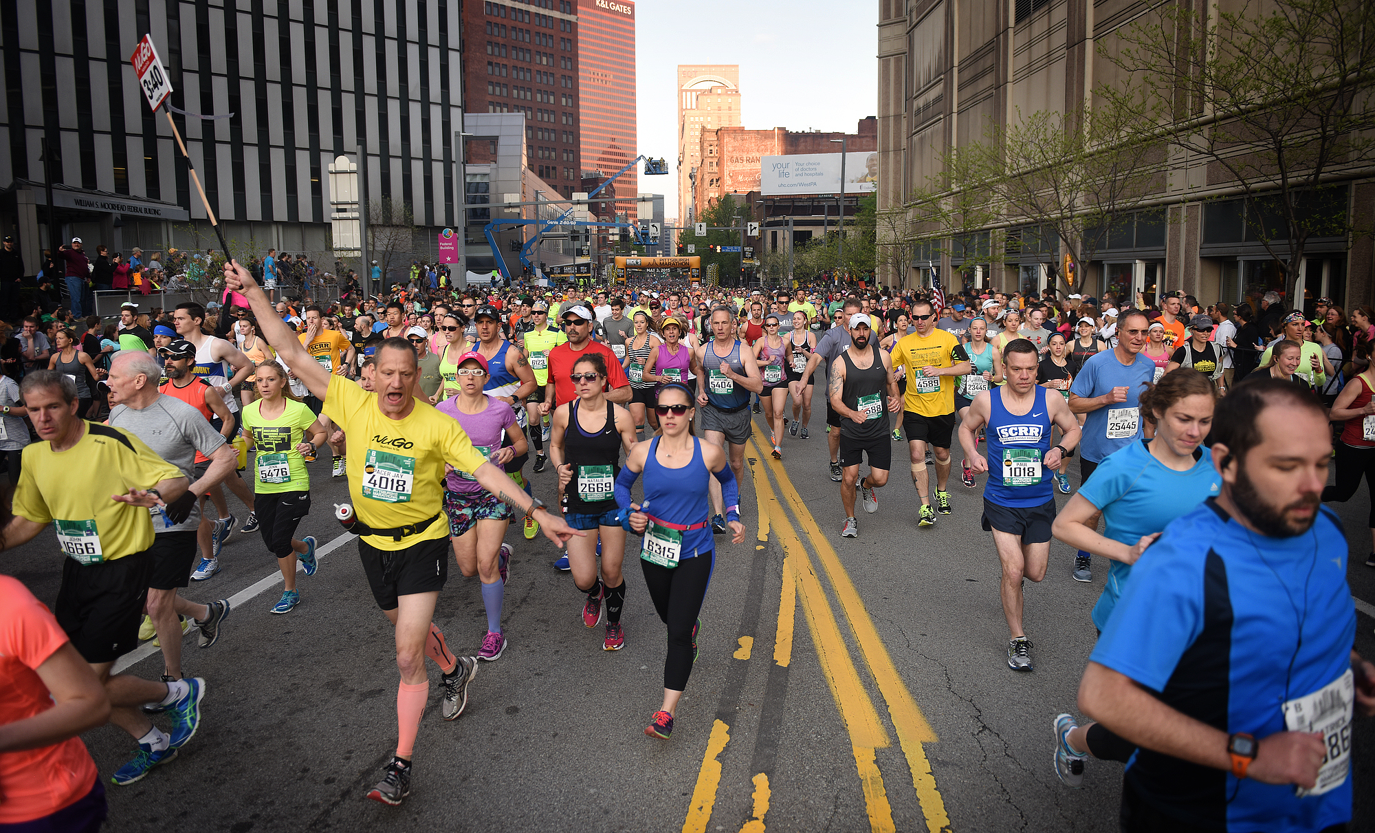 Runners clog Liberty Avenue near Grant Street.  (Steve Mellon/Post-Gazette)