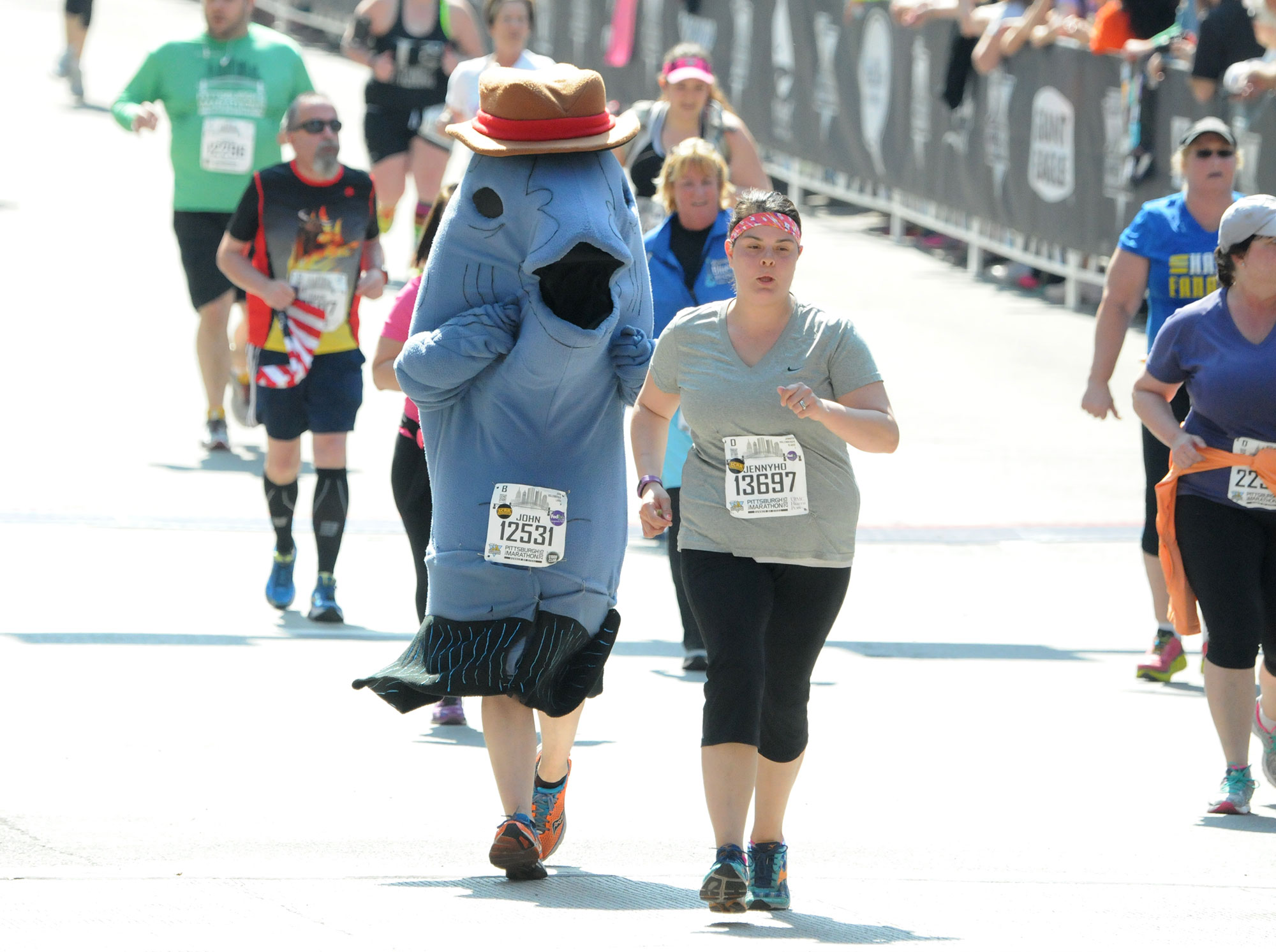 'Big Fish' John Hollenberger, of Pittsburgh, followed wife Jennifer to the finish line at the 2015 Pittsburgh Marathon.  (Bob Donaldson/Post-Gazette)